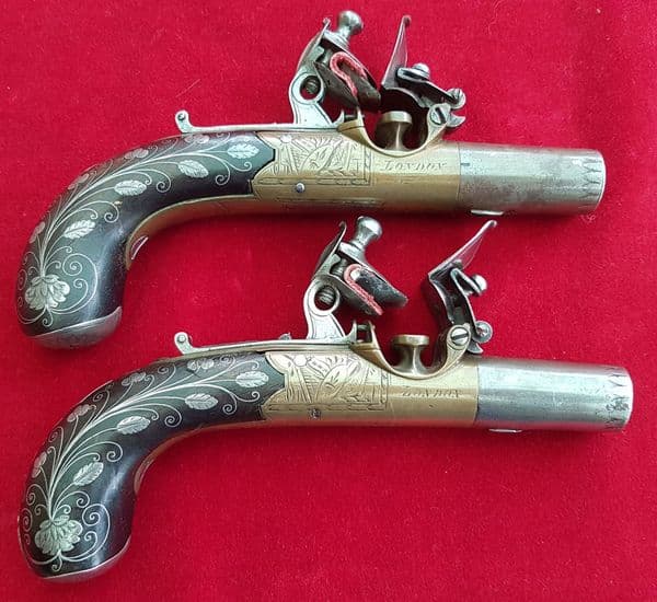 X X X SOLD X X X Pair English Flintlock pocket Pistols with silver wire inlay. By TIPPING. Ref 1570.